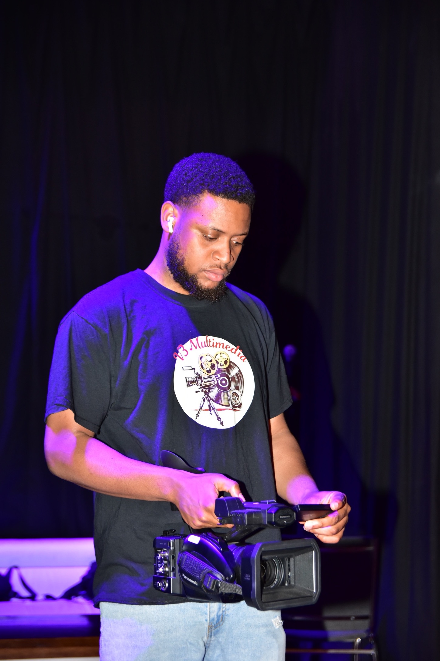 V3 Multimedia team preparing for a live event